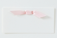 Geburtsanzeige mit rosa Knoten