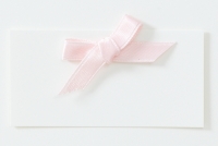 Geburtsanzeige mit rosa Schleife